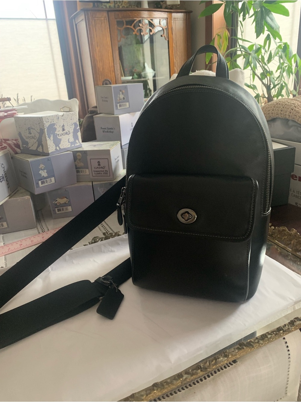 Coach Black Leather Men's Sling Backpack with Front Turn-Lock